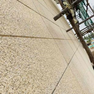 黄冈 黄金麻花岗岩荔枝面外墙干挂石材效果示例