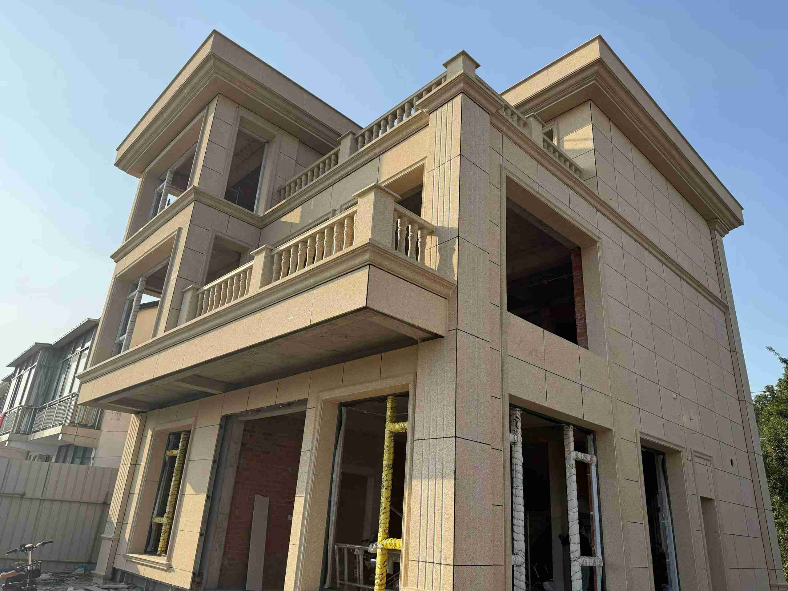 黄冈 黄金麻花岗岩石材荔枝面外墙干挂效果展示